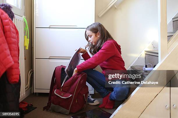 a 10 years old girl preparing to go to school - 10 11 years old stock pictures, royalty-free photos & images