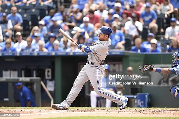 Josh Thole of the Toronto Blue Jays bats against the Kansas City Royals on August 7, 2016 at Kauffman Stadium in Kansas City, Missouri. The Kansas...