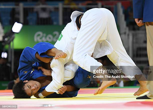 Ryunosuke Haga of Japan and Lukas Krpalek of the Czech Republic compete during the men's -100kg Quarterfinal on Day 6 of the 2016 Rio Olympics at...