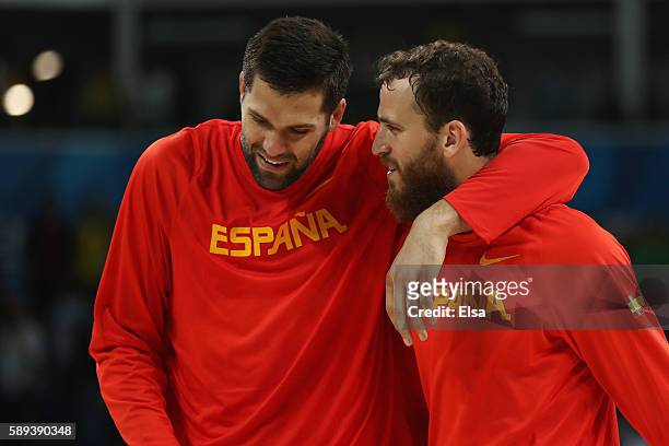 Felipe Reyes and Sergio Rodriguez of Spain celebrate after the Men's Preliminary Round Group B between Spain and Lithuania on Day 8 of the Rio 2016...