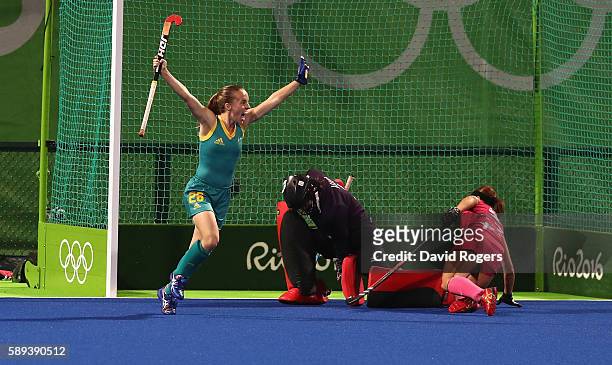 Emily Smith of Australia celebrates after scoring their second goal during the Women's Pool B hockey match between Australia and Japan on Day 8 of...