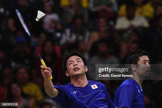 Kenichi Hayakawa and Hiroyuki Endo of Japan compete against B. Sumeeth Reddy and Manu Attri of Indonesia during the Mixed's Doubles Play Stage Group...