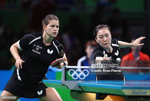 Petrissa Solja and Xiaona Shan of Germany play agsinst Hong Kong during the Table Tennis Women's Team Round Quarter Final between Germany and Hong...