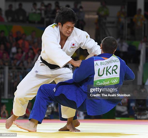 Ryunosuke Haga of Japan and Artem Bloshenko of Ukraine compete in the Men's -100kg bronze medal B contest on Day 6 of the 2016 Rio Olympics at...