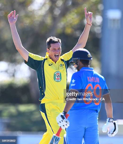 Chris Tremain of Australia A celebrates taking the wicket of Karun Nair of India A during the One Day match between Australia A and India A at Tony...