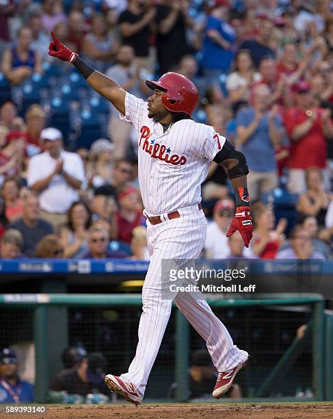 Maikel Franco of the Philadelphia Phillies reacts after hitting a three run home run in the bottom of the first inning against the Colorado Rockies...