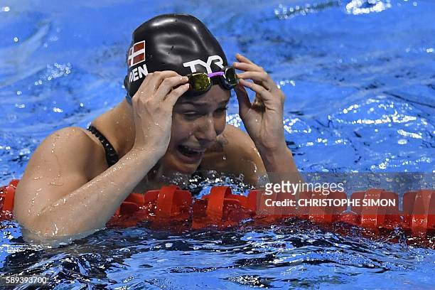 Pernille Blume of Denmark reacts as she won the Women's swimming 50m Freestyle Final at the Rio 2016 Olympic Games at the Olympic Aquatics Stadium in...