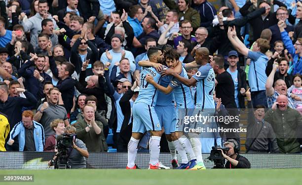 Manchester City players celebrate the first goal during the Premier League match between Manchester City and Sunderland at Etihad Stadium on August...