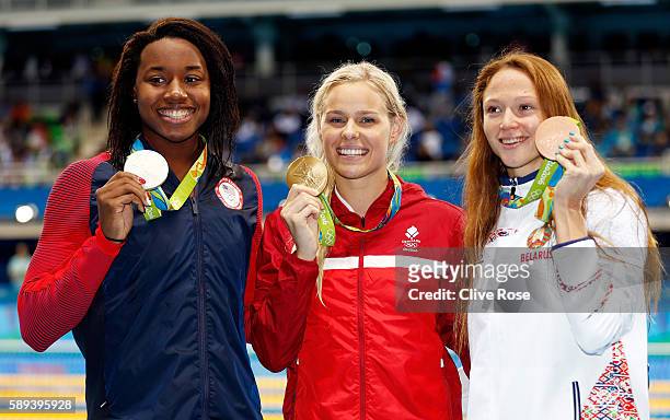 Silver medalist Simone Manuel of the United States, Gold medalist Pernille Blume of Denmark and Bronze medalist Aliaksandra Herasimenia of Belarus...