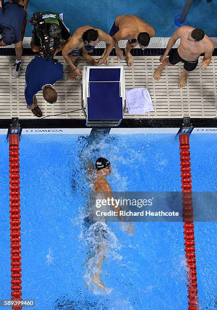 Nathan Adrian of the United States touches the wall wo win gold in the Men's 4 x 100m Medley Relay Final on Day 8 of the Rio 2016 Olympic Games at...