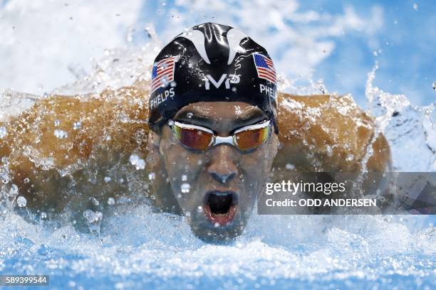 S Michael Phelps competes in the Men's swimming 4 x 100m Medley Relay Final at the Rio 2016 Olympic Games at the Olympic Aquatics Stadium in Rio de...