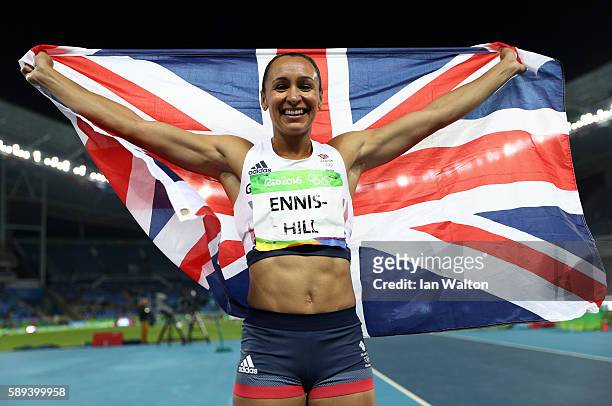 Jessica Ennis-Hill of Great Britain celebrates winning a silver medal in the Women's Heptathlon on Day 8 of the Rio 2016 Olympic Games at the Olympic...