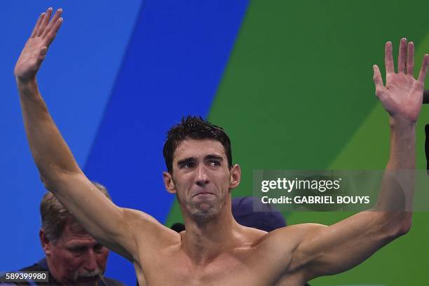 Gold medallist USA's Michael Phelps, reacts after the Men's swimming 4 x 100m Medley Relay Final at the Rio 2016 Olympic Games at the Olympic...