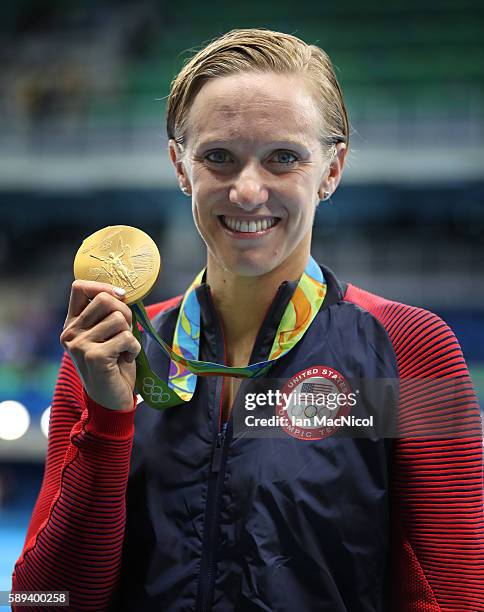 Dana Volmer of United States poses with her Gold medal from the Women's 4x100m Medely Relay on Day 8 of the Rio 2016 Olympic Games at the Olympic...