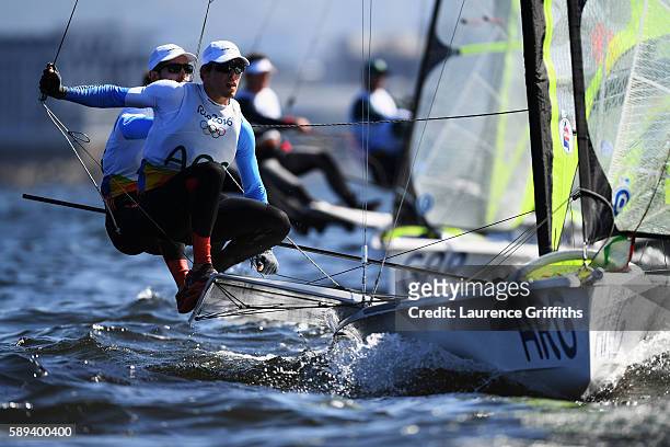 Yago Lange of Argentina and Klaus Lange of Argentina compete in the Men's 49er class on Day 8 of the Rio 2016 Olympic Games at the Marina da Gloria...