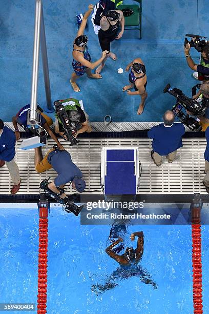 Team United States celebrate winning gold in the Women's 4 x 100m Medley Relay Final on Day 8 of the Rio 2016 Olympic Games at the Olympic Aquatics...