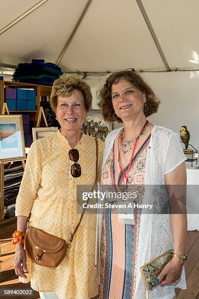 Pat Garrity and Ginnie Frati attend the 10th Annual Get Wild Summer Benefit on August 13, 2016 in Bridgehampton, New York.
