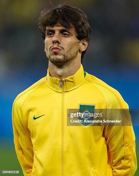 Rodrigo Caio of Brazil stand for the national anthen before the match between Brazil and Colombia mens football quarter final at Arena Corinthians on...