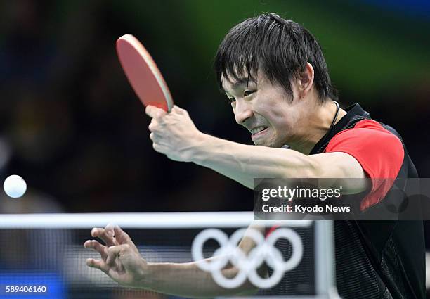Japan's Koki Niwa competes against Jakub Dyjas of Poland in a table tennis men's team event first-round match at the Rio de Janeiro Olympics on Aug....
