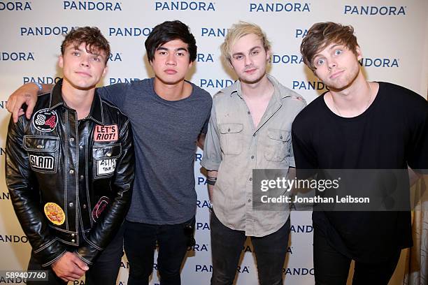 Recording artists Ashton Irwin, Calum Hood, Michael Clifford, and Luke Hemmings of 5 Seconds of Summer attend Pandora Summer Crush at LA Live on...