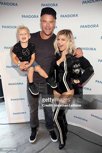 Axl Jack Duhamel, actor Josh Duhamel, and singer Fergie attend Pandora Summer Crush at LA Live on August 13, 2016 in Los Angeles, California.