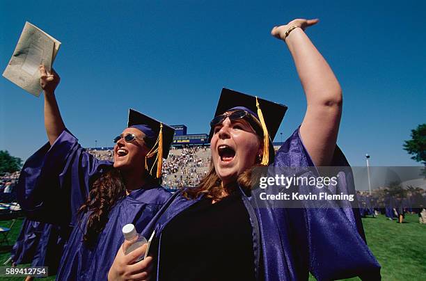 graduates rejoicing at commencement - newark stock pictures, royalty-free photos & images