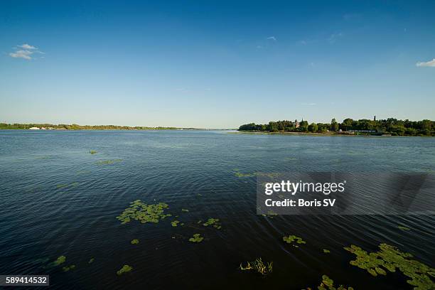 the confluence of kotorosl' river and volga river in yaroslavl', russia - volga river stock pictures, royalty-free photos & images