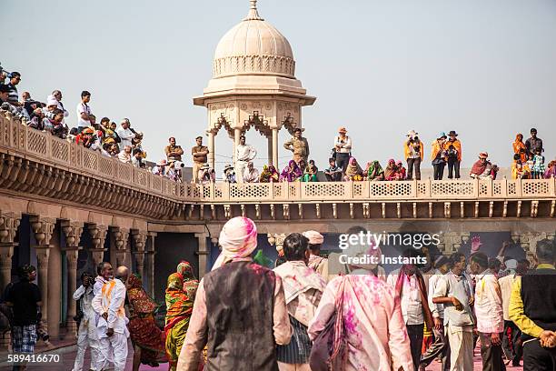 holi festival crowd - mathura stock pictures, royalty-free photos & images