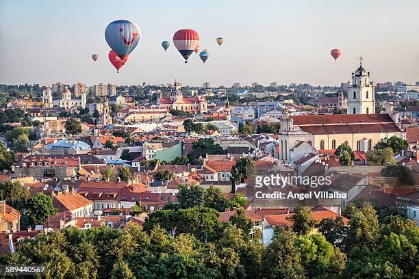 balloons over vilnius - vilnius stock pictures, royalty-free photos & images