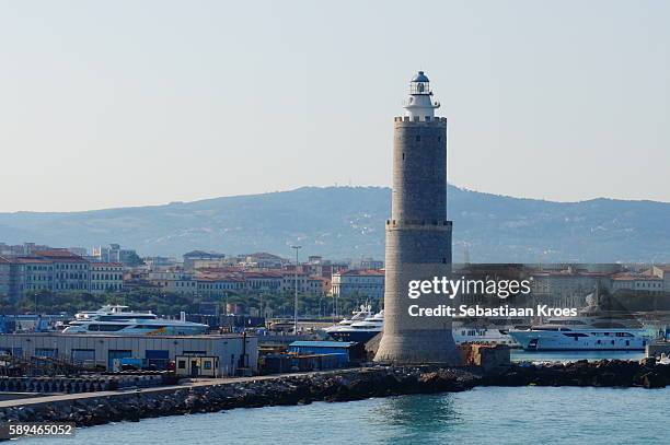 lighthouse of livorno and surroundings, italy - livorno foto e immagini stock