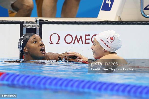 Day 6 Simone Manuel of the United States who dead heated with Penny Oleksiak of Canada to both win the gold medal in the Women's 100m Freestyle Final...