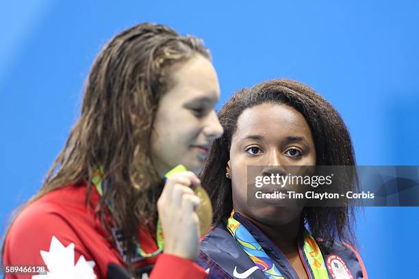 Day 6 Simone Manuel of the United States who dead heated with Penny Oleksiak of Canada to both win the gold medal in the Women's 100m Freestyle Final...
