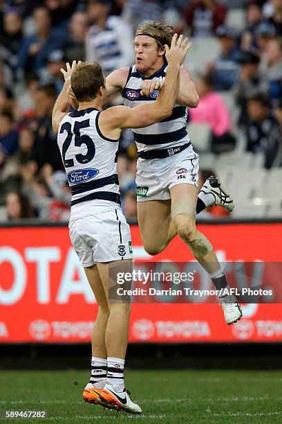 Josh Caddy of the Cats celebrates a goal during the round 21 AFL match between the Richmond Tigers and the Geelong Cats at Melbourne Cricket Ground...