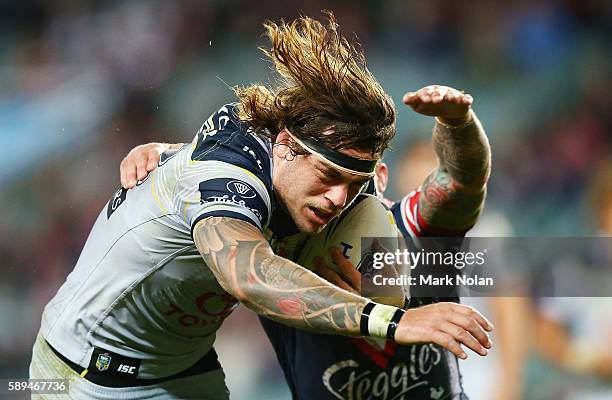 Ethan Lowe of the Cowboys runs the ball during the round 23 NRL match between the Sydney Roosters and the North Queensland Cowboys at Allianz Stadium...