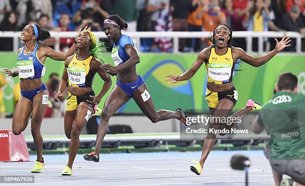 Jamaican sprinter Elaine Thompson wins the women's 100-meter final in the athletics competition of the Rio de Janeiro Olympic Games on Aug. 13 with...