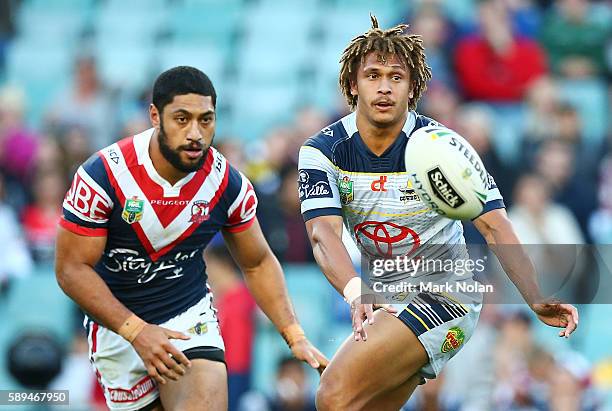 Ray Thompson of the Cowboys passes during the round 23 NRL match between the Sydney Roosters and the North Queensland Cowboys at Allianz Stadium on...