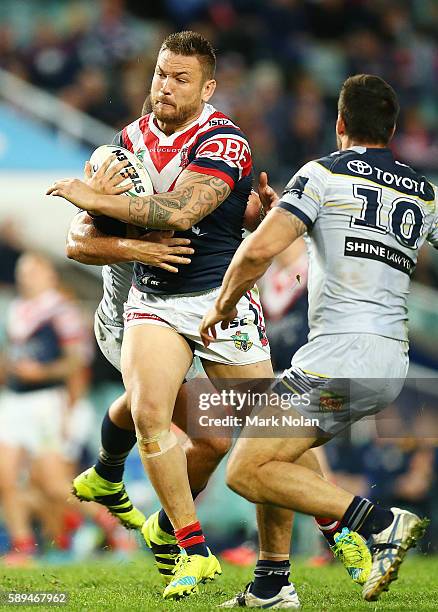 Jared Waerea-Hargreaves of the Roosters runs the ball during the round 23 NRL match between the Sydney Roosters and the North Queensland Cowboys at...