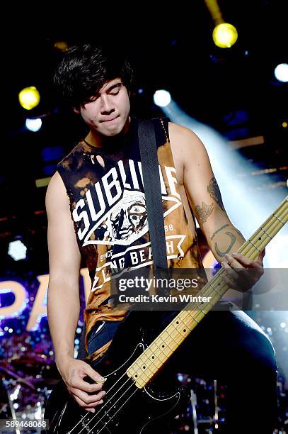 Musician Calum Hood of 5 Seconds of Summer performs at the Pandora Summer Crush at L.A. Live on August 13, 2016 in Los Angeles, California.