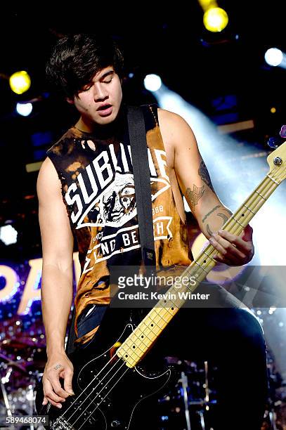 Musician Calum Hood of 5 Seconds of Summer performs at the Pandora Summer Crush at L.A. Live on August 13, 2016 in Los Angeles, California.