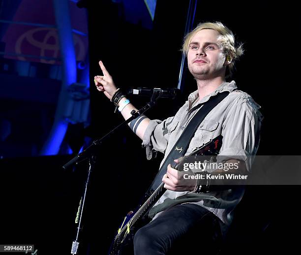 Musician Michael Clifford of 5 Seconds of Summer performs at the Pandora Summer Crush at L.A. Live on August 13, 2016 in Los Angeles, California.