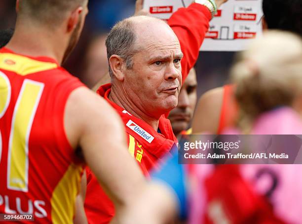Rodney Eade, Senior Coach of the Suns addresses his players during the 2016 AFL Round 21 match between the Essendon Bombers and the Gold Coast Suns...