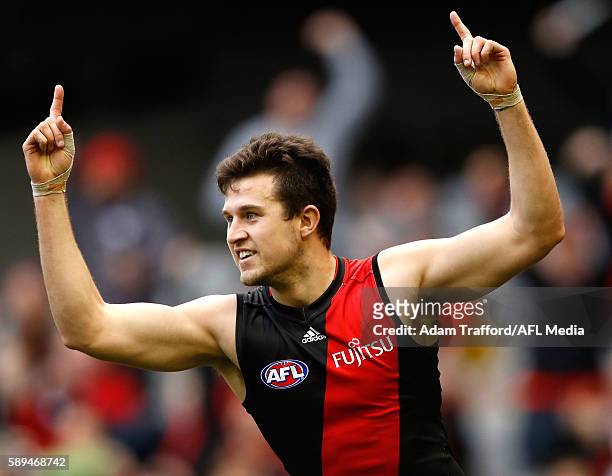 Jackson Merrett of the Bombers celebrates a goal during the 2016 AFL Round 21 match between the Essendon Bombers and the Gold Coast Suns at Etihad...