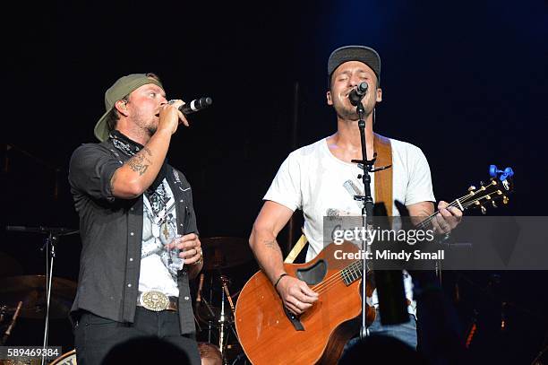 Recording artists Stephen Barker Liles and Eric Gunderson of Love & Theft perform during Coyote CountryFest at the Orleans Arena on August 13, 2016...