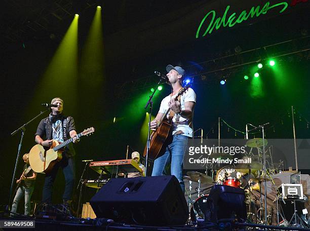Recording artists Stephen Barker Liles and Eric Gunderson of Love & Theft perform during Coyote CountryFest at the Orleans Arena on August 13, 2016...