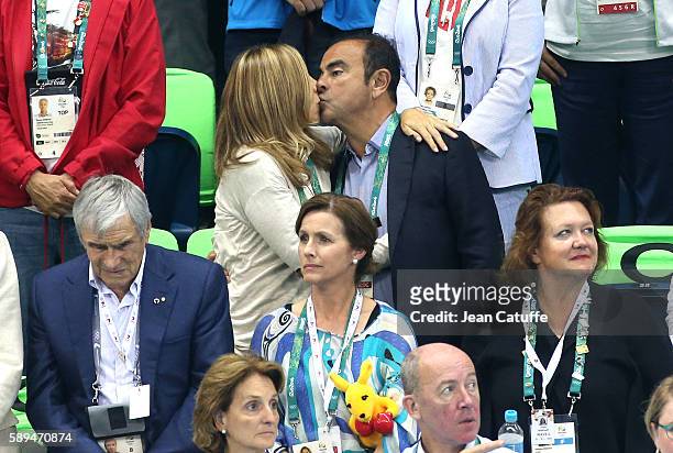 Of Nissan and CEO of Renault Carlos Ghosn and his wife Carole Ghosn attend the swimming finals on day 8 of the Rio 2016 Olympic Games at Olympic...