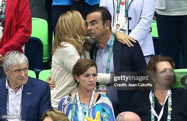 Of Nissan and CEO of Renault Carlos Ghosn and his wife Carole Ghosn attend the swimming finals on day 8 of the Rio 2016 Olympic Games at Olympic...