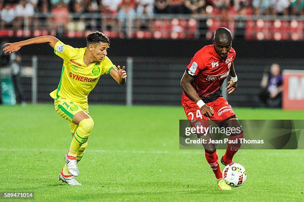 Amine HARIT of Nantes and Dylan BAHAMBOULA of Dijon during the football Ligue 1 match between Dijon FCO and Fc Nantes at Stade Gaston Gerard on...