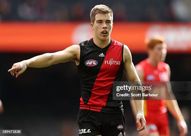 Zach Merrett of the Bombers directs his teammates during the round 21 AFL match between the Essendon Bombers and the Gold Coast Suns at Etihad...