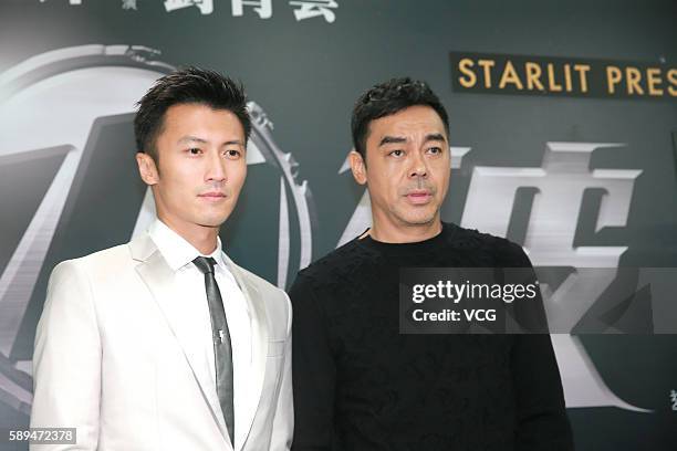 Actor Nicholas Tse and actor Sean Lau attend the premiere of film "Hearfall Arises" on August 13, 2016 in Hong Kong, China.