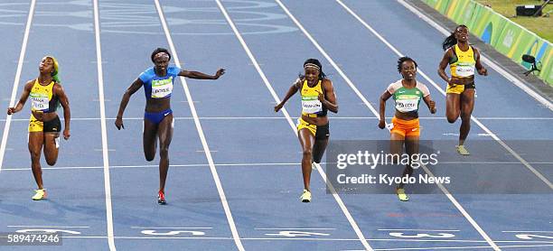 Jamaican sprinter Elaine Thompson wins the women's 100-meter final in the athletics competition of the Rio de Janeiro Olympic Games on August 13,...